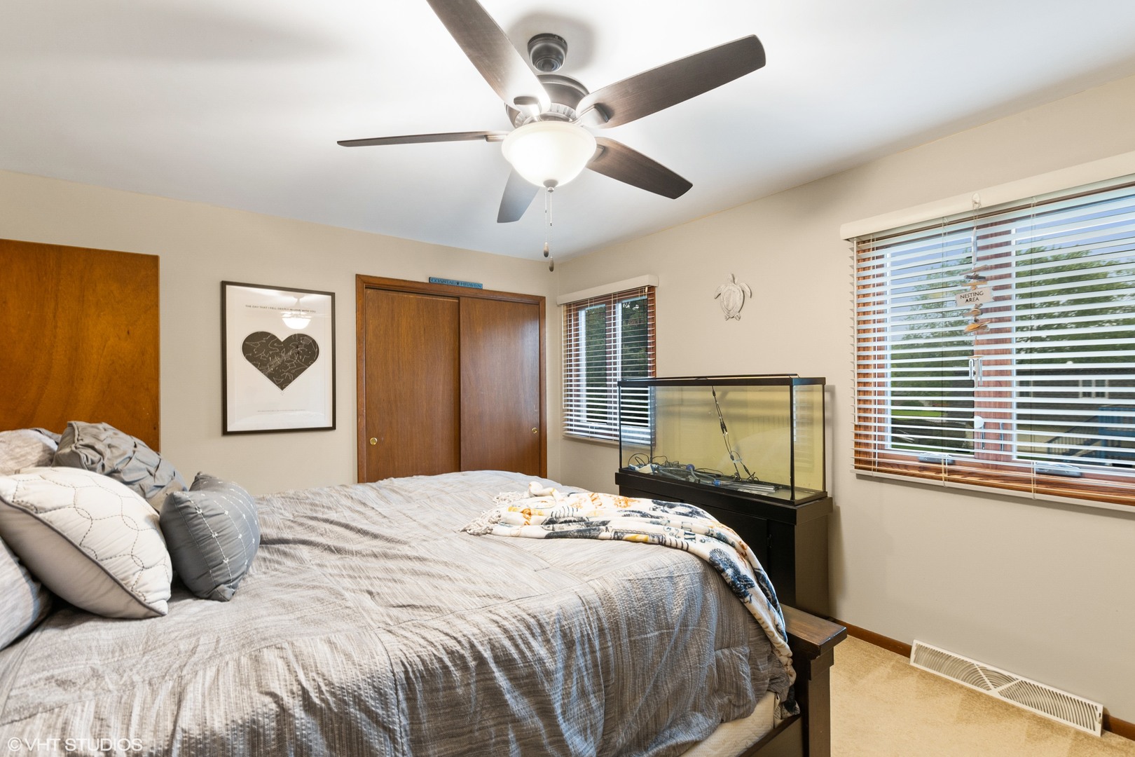 270 East Woodlawn Road, Unit 270 New Lenox, IL 60451 - Photo 7 of 14 a bedroom with a large bed and a window