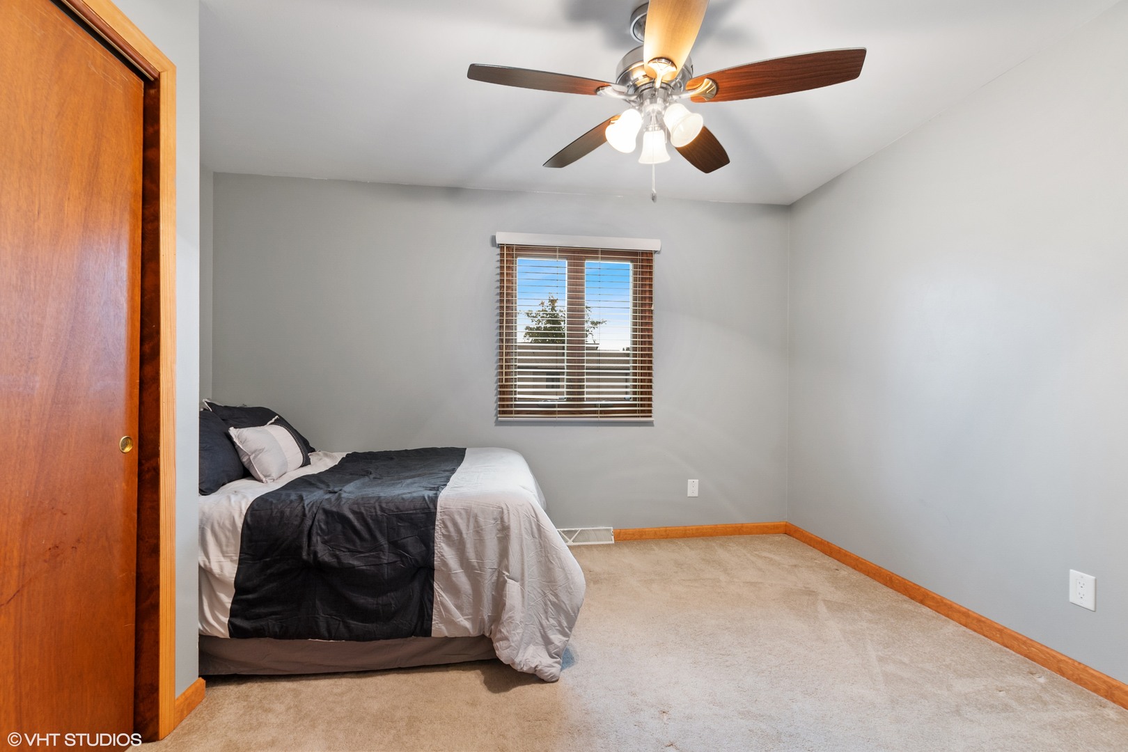 270 East Woodlawn Road, Unit 270 New Lenox, IL 60451 - Photo 8 of 14 a bedroom with a bed and a window