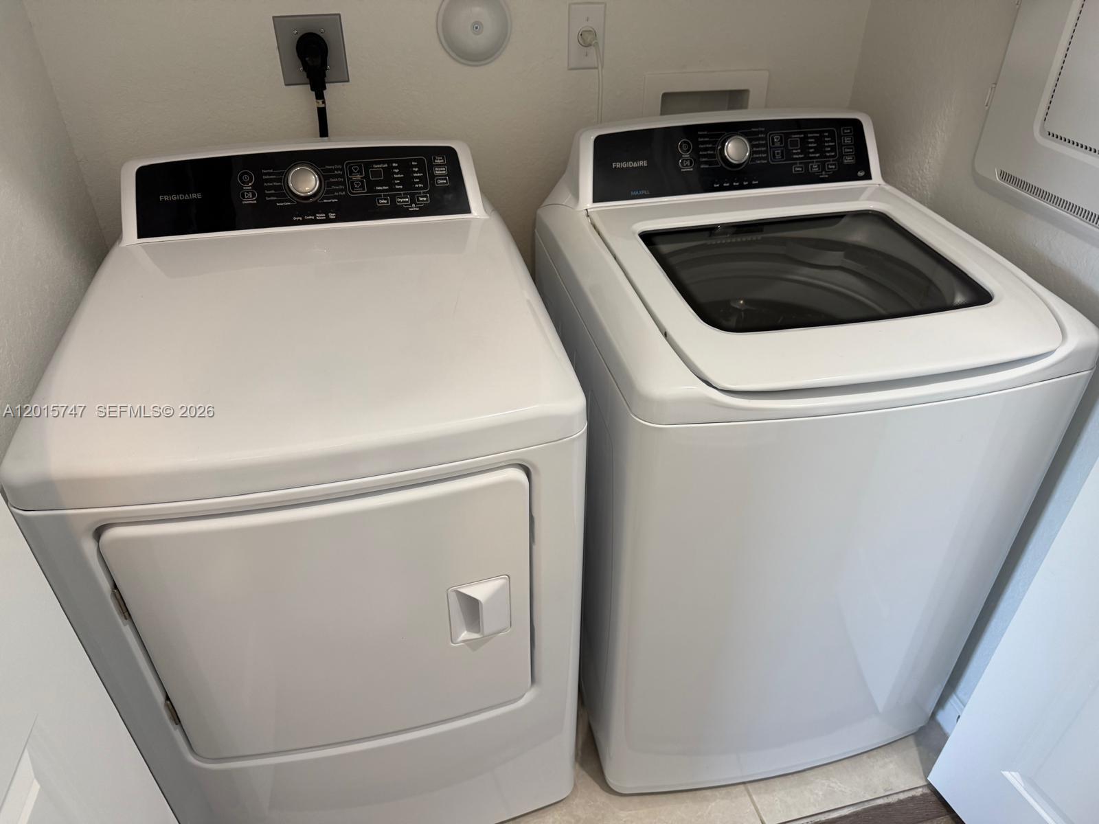 2614 Southeast 13th Street Homestead, FL 33035 - Photo 13 of 19 a utility room with dryer and washer
