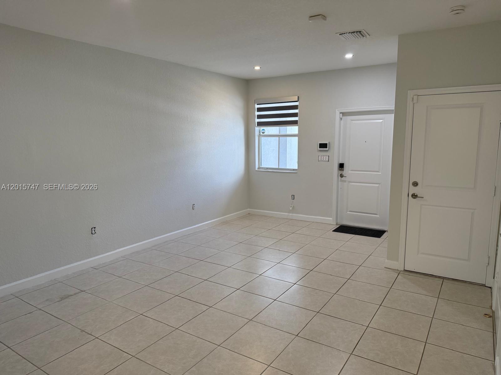 2614 Southeast 13th Street Homestead, FL 33035 - Photo 2 of 19 a view of an empty room