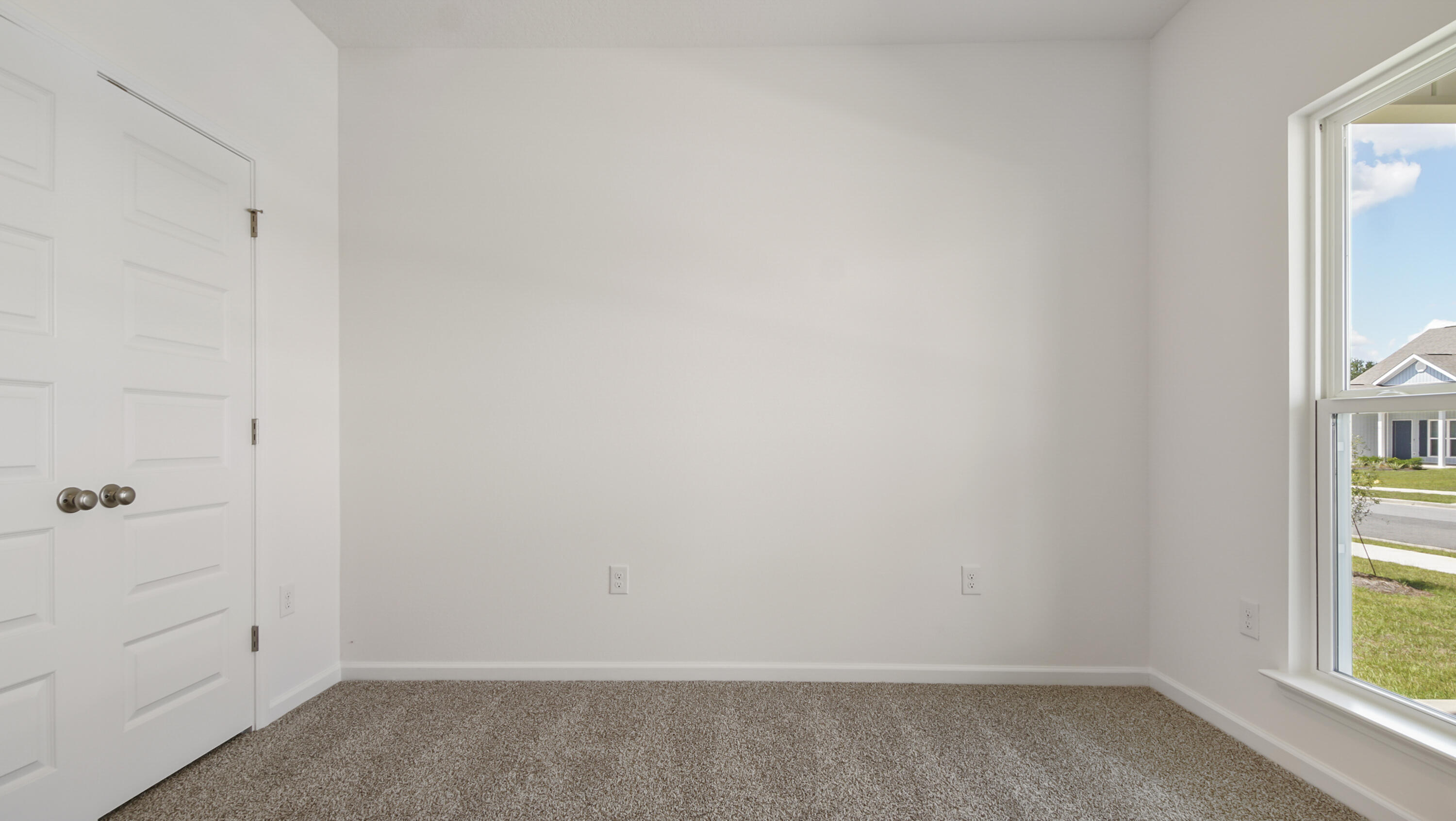 335 Bluebeech Street Freeport, FL 32439 - Photo 26 of 32 an empty room with windows