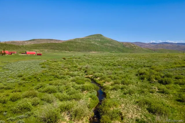 a view of mountain with sunset view