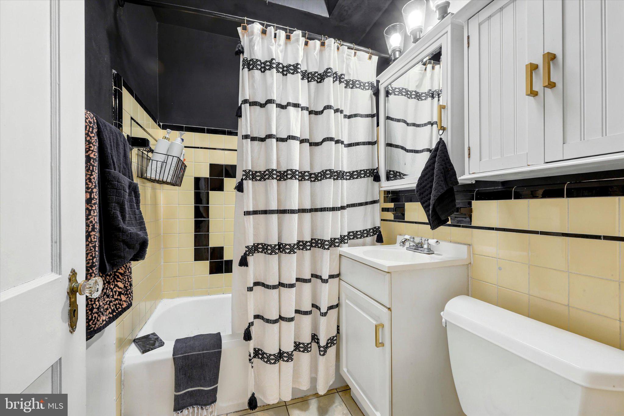 115 Academy Lane Upper Darby, PA 19082 - Photo 20 of 25 a bathroom with a sink toilet and shower