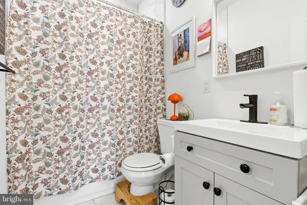 a bathroom with a sink and a toilet