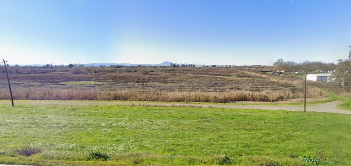 525 Brannan Isle Isleton, CA 95641 - Photo 1 of 1 a view of a field with a big yard