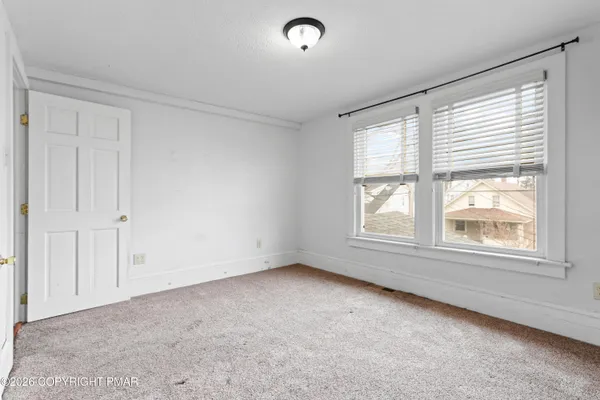 an empty room with a window