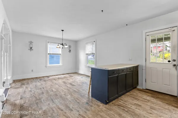 a kitchen with stainless steel appliances granite countertop a stove and a sink