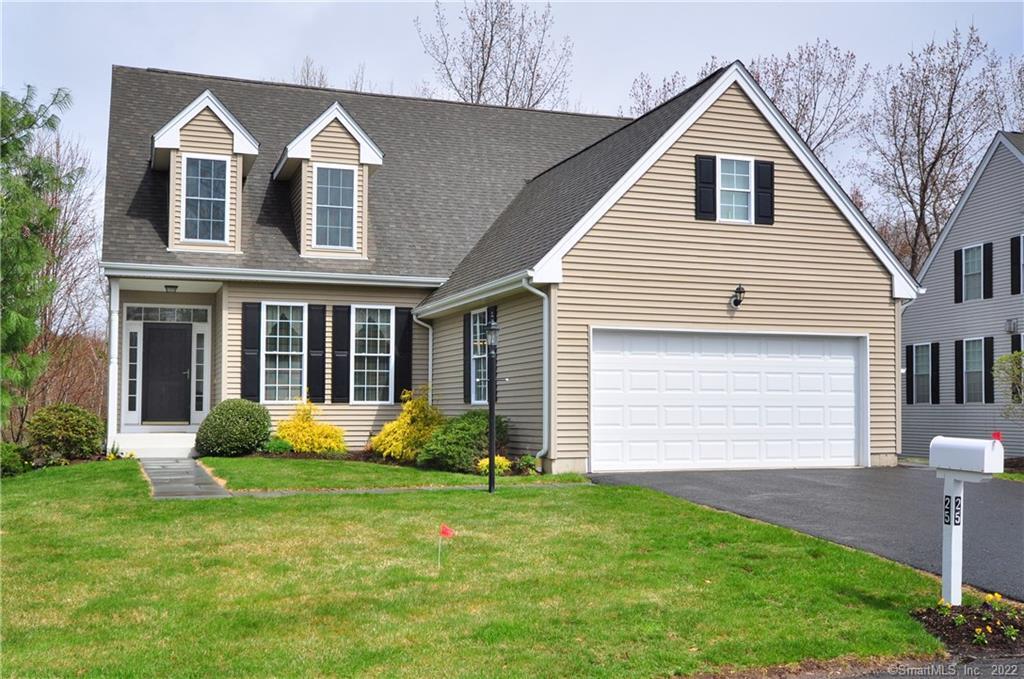 25 Kenington Road Avon, CT 06001 - Photo 1 of 1 a front view of house with yard and green space
