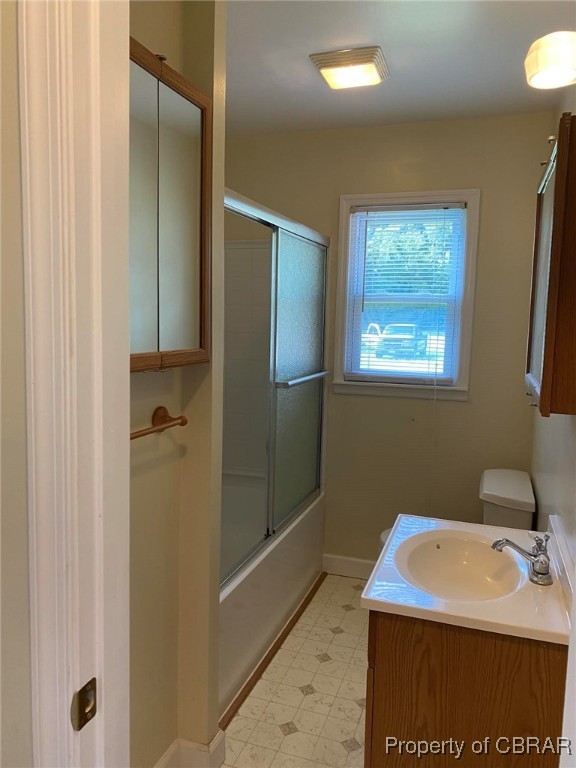 335 Hicks Road Hudgins, VA 23076 - Photo 14 of 21 a bathroom with a sink a mirror and a shower