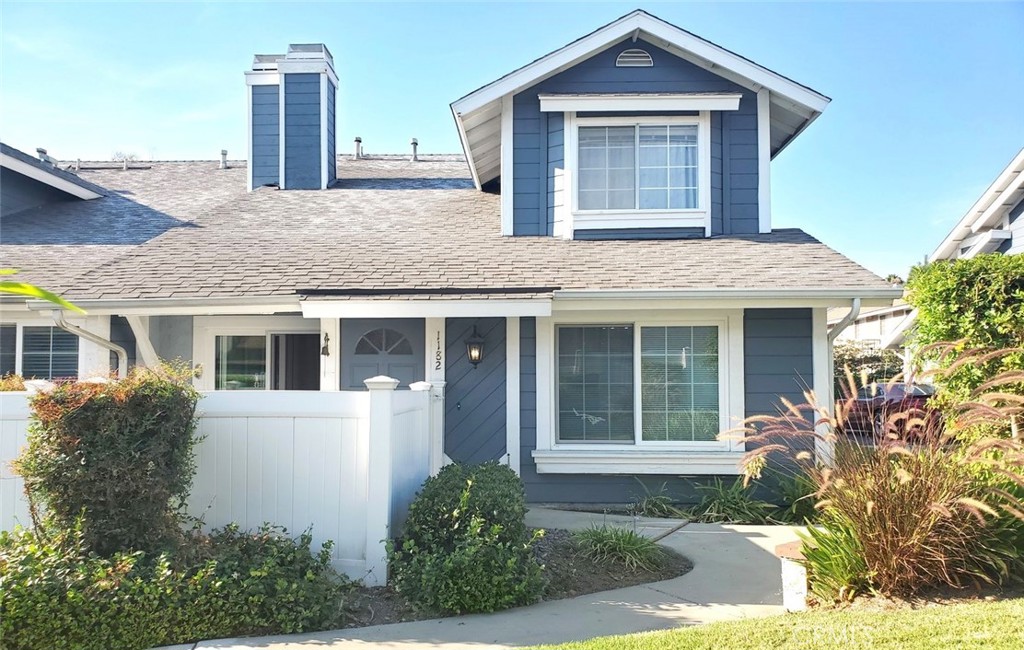 1182 North Sunflower Avenue Covina, CA 91724 - Photo 1 of 20 a front view of a house with garden