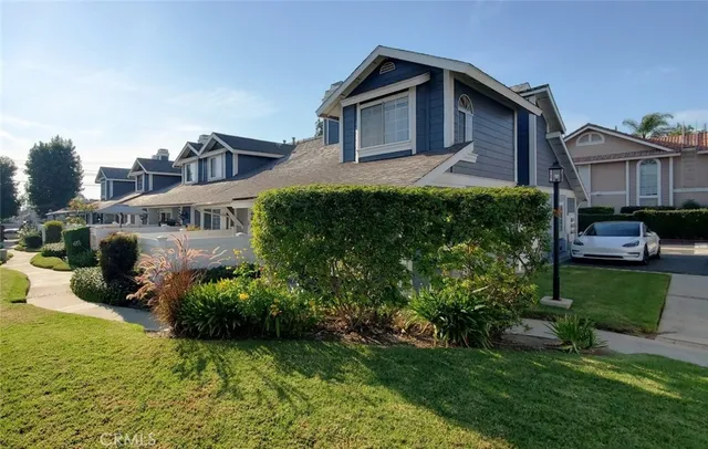 a house view with a garden space
