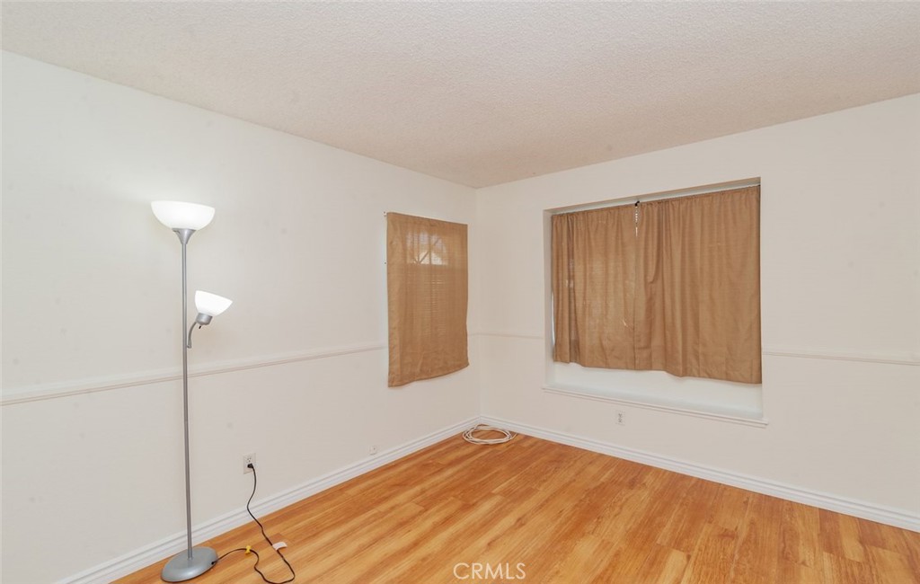 1182 North Sunflower Avenue Covina, CA 91724 - Photo 13 of 20 a view of an empty room and window