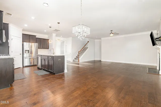 a view of living room with furniture and flat screen tv