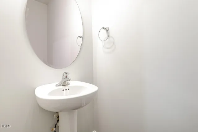 a kitchen with stainless steel appliances kitchen island granite countertop a stove a sink and a microwave