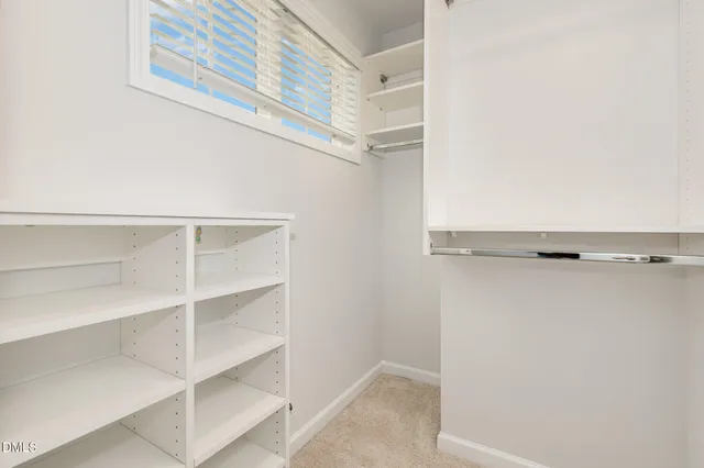 a bathroom with a granite countertop sink a mirror and a