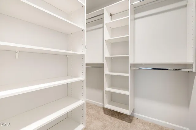 a view of an empty walk in closet