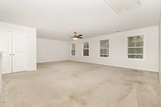 a view of an empty walk in closet