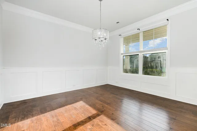a view of gallery with wooden floor