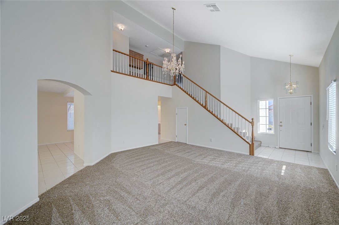 3213 Shallow Point Circle Las Vegas, NV 89117 - Photo 6 of 43 Living room with view of staircase