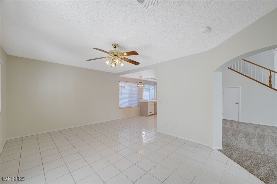 3213 Shallow Point Circle Las Vegas, NV 89117 - Photo 8 of 43 Family room view towards the kitchen on left and living room to the right
