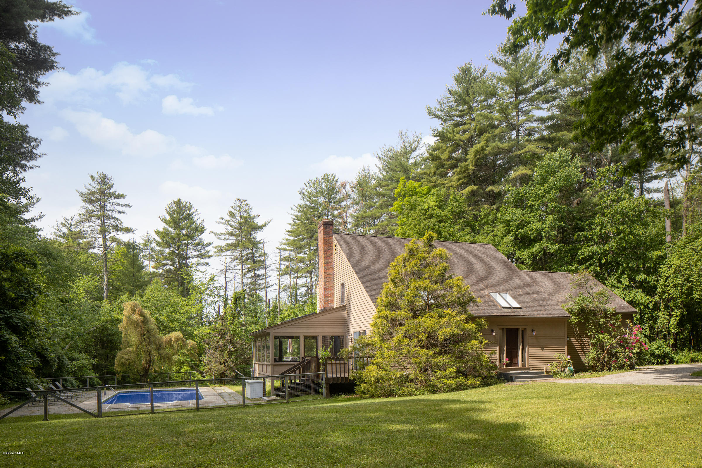 a view of a house with a garden