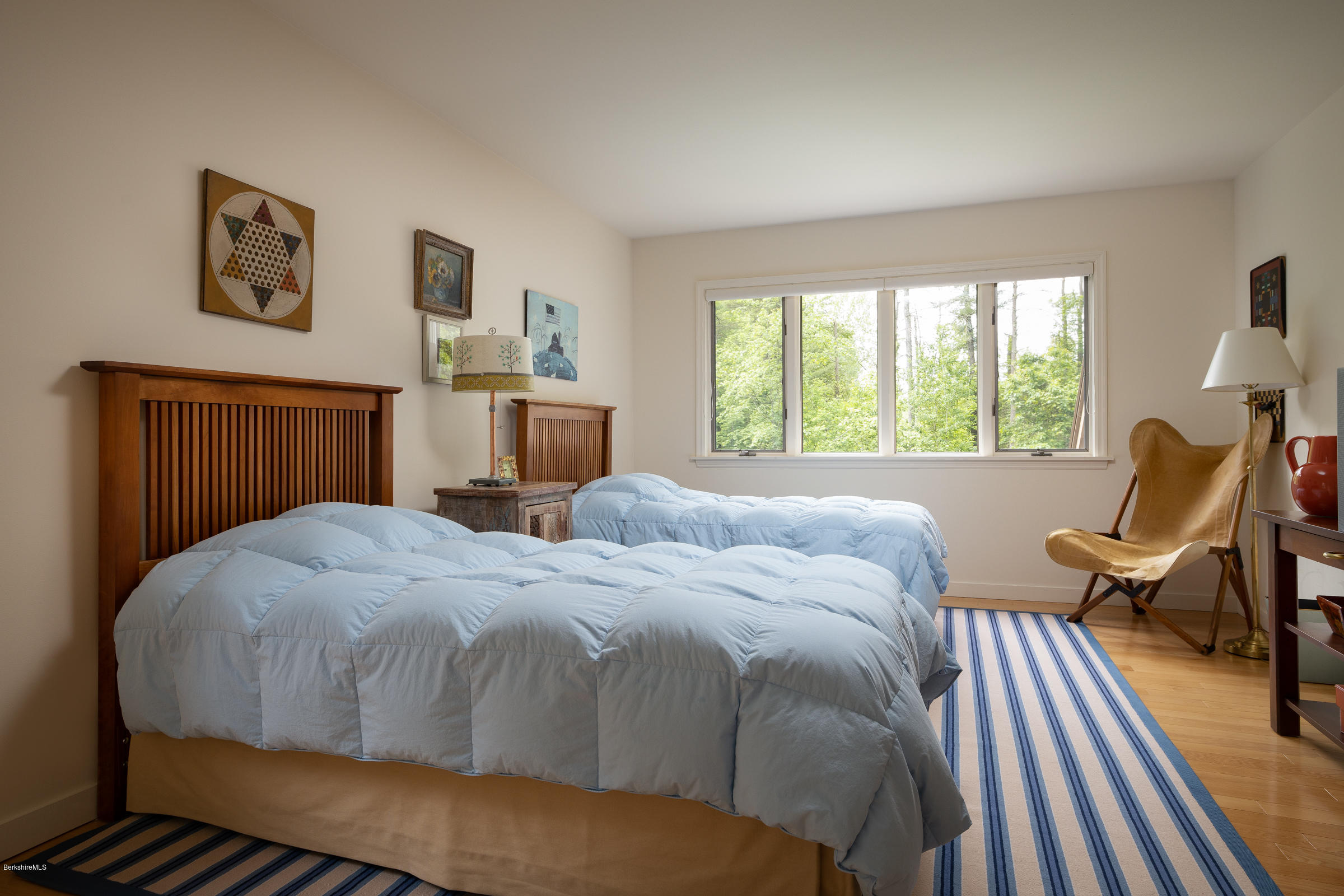 23 Cross Road Alford, MA 01230 - Photo 18 of 22 a bedroom with a bed and wooden floor