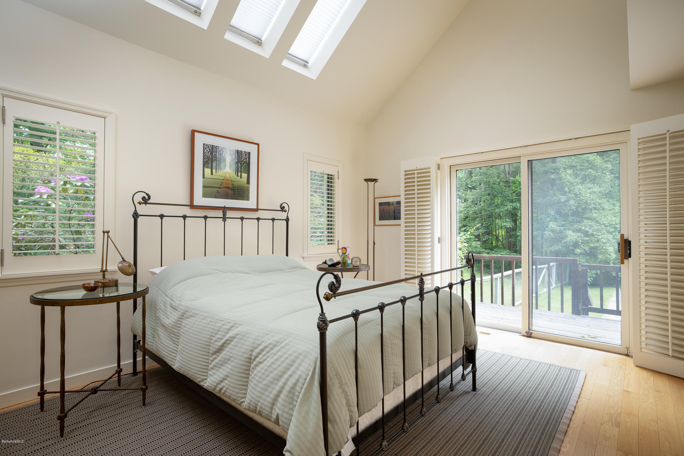 23 Cross Road Alford, MA 01230 - Photo 20 of 22 a bedroom with a bed and wooden floor