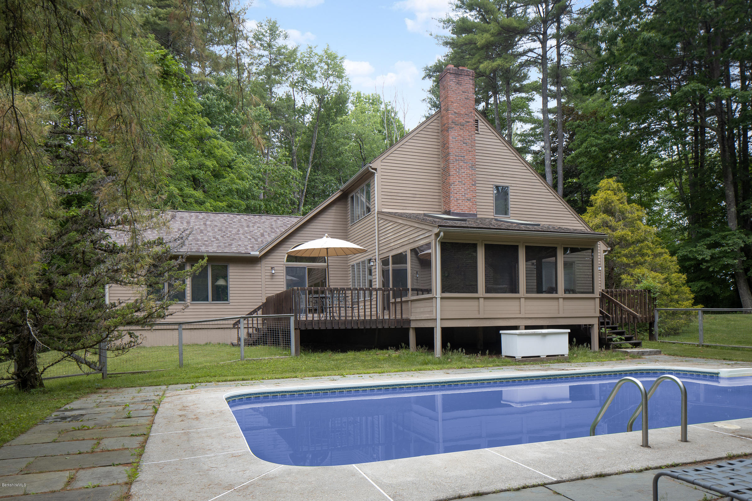 23 Cross Road Alford, MA 01230 - Photo 5 of 22 a front view of a house with a swimming pool