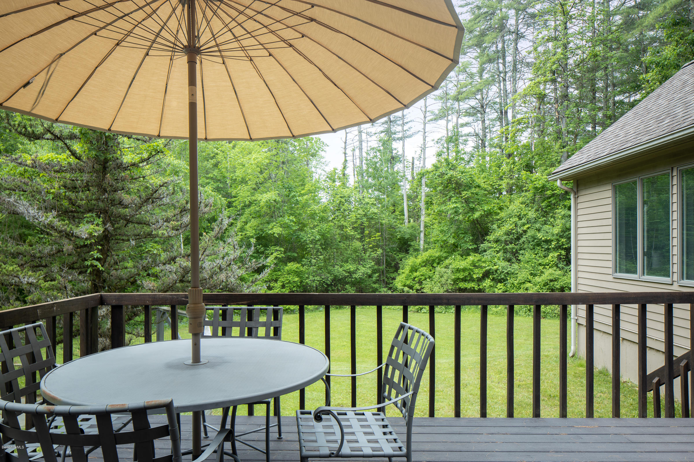 23 Cross Road Alford, MA 01230 - Photo 6 of 22 a view of a wooden chairs and table in the deck