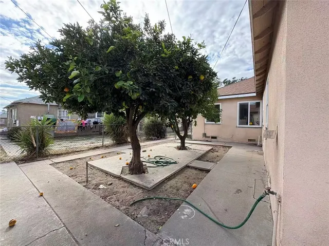 a view of a house with entertaining space