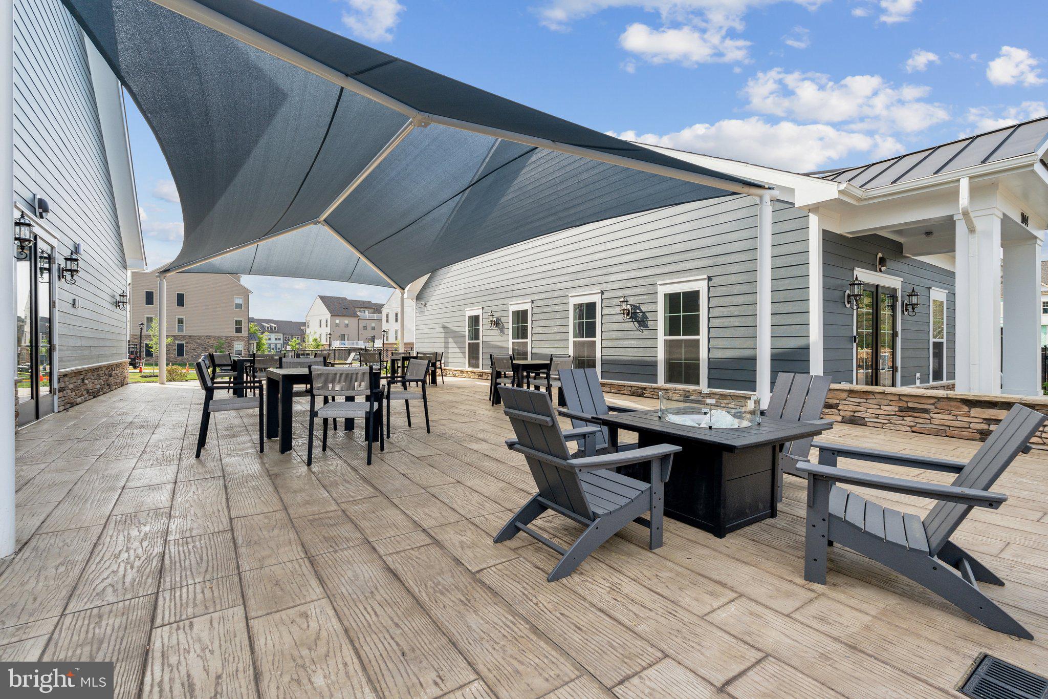 1055 Inferno Terrace Southeast Leesburg, VA 20175 - Photo 25 of 31 a outdoor space with lots of chairs a table and chairs