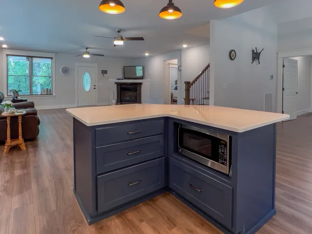 a kitchen with a stove and a sink