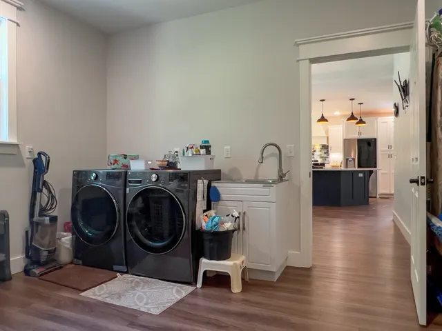 a bedroom with a bed and cabinets
