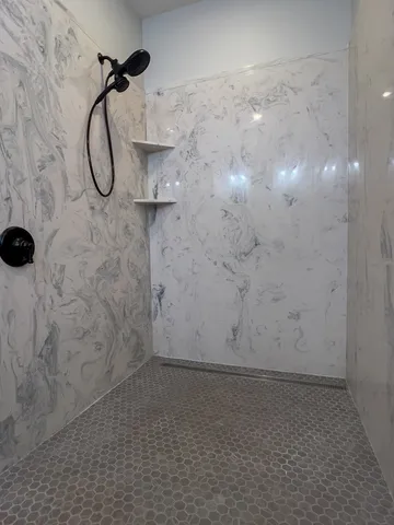 a view of hallway with washer and dryer