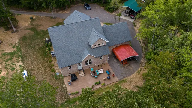 a view of a lake with a yard