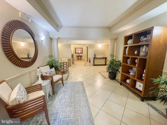 a sign that is sitting in front of flowers