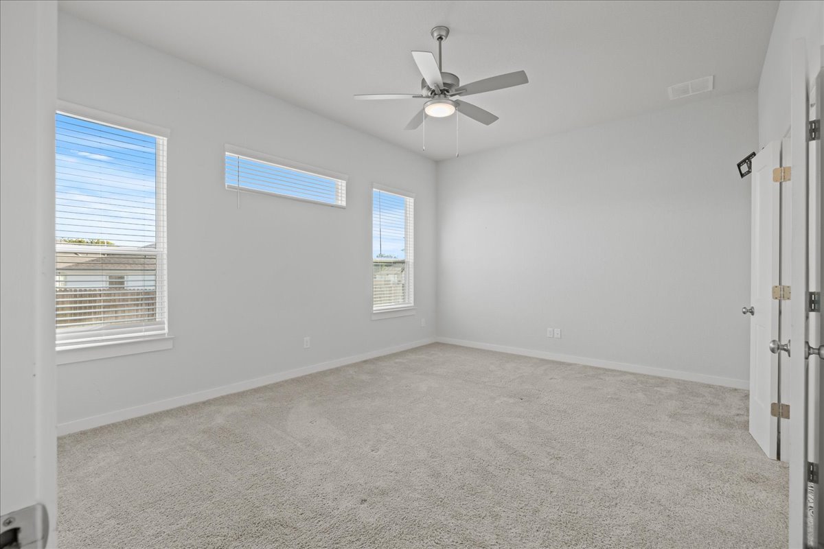 1027 Haystack New Braunfels, TX 78130 - Photo 6 of 15 a view of an empty room with a window