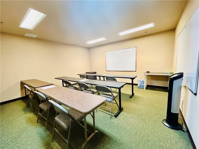 a room with furniture pool table and a table