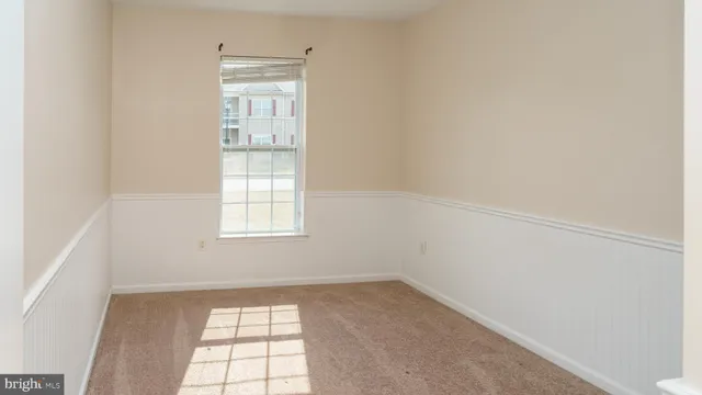 a chair and table in front of house