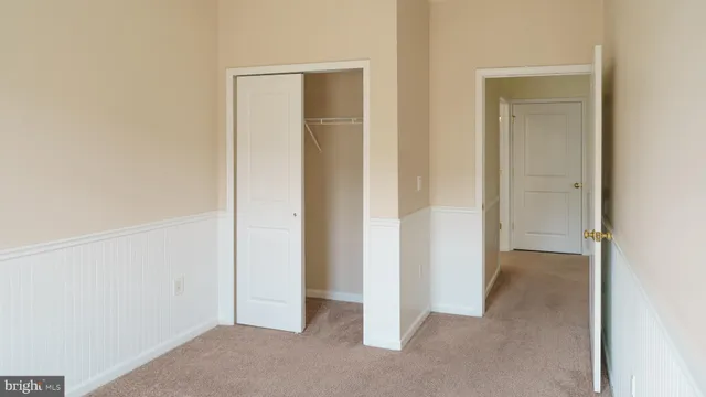 a view of a lake with houses in the back