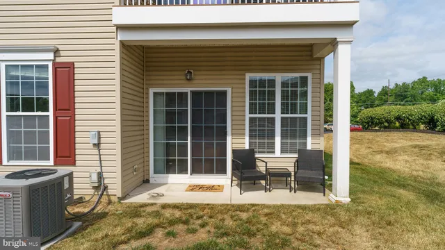 a view of a yard with swings