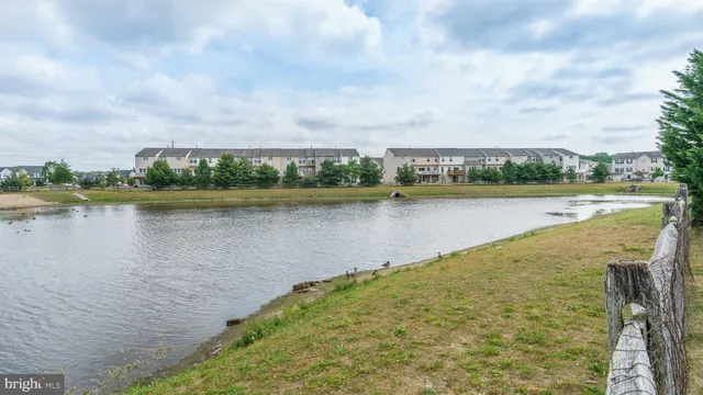 a view of a swimming pool with a lounge chairs