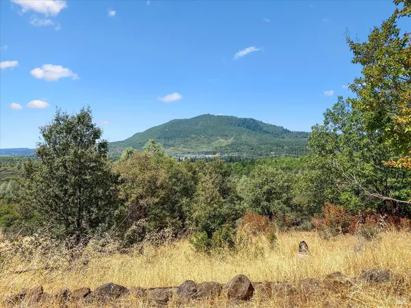 a view of mountain view with mountains in the background