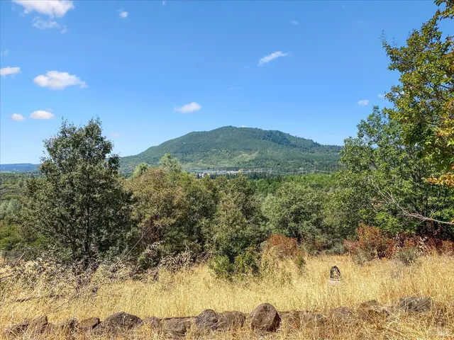 a view of mountain view with mountains in the background