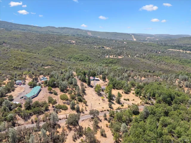 a view of mountain view with mountains in the background