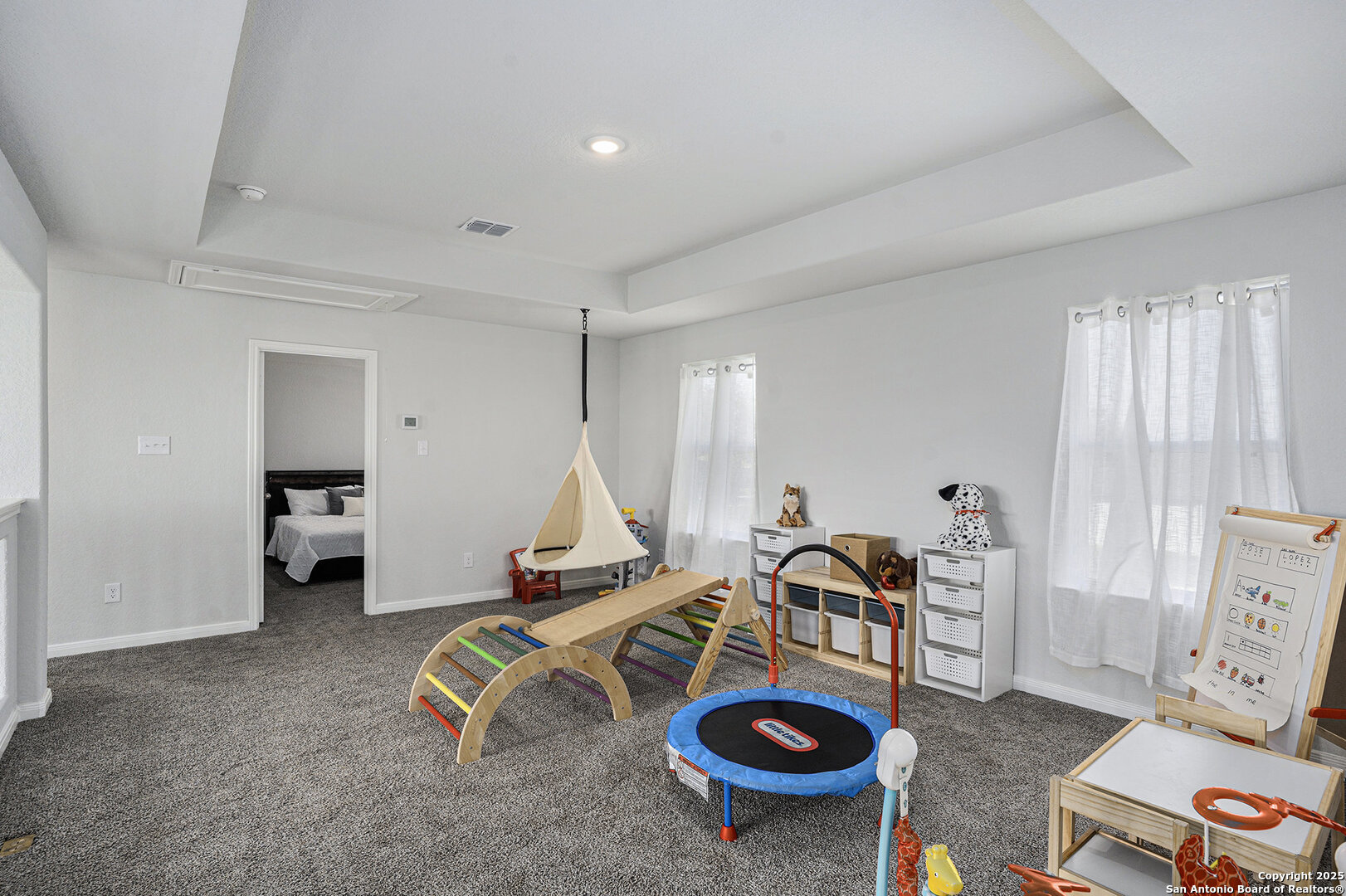 16615 Ginger Crossing Elmendorf, TX 78112 - Photo 15 of 31 a view of a room with gym equipment