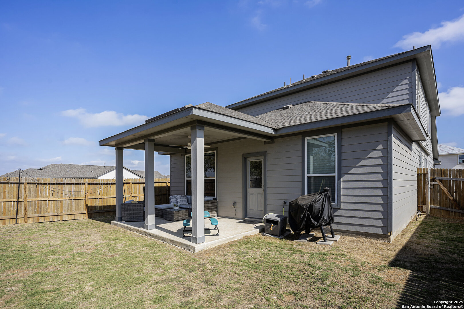 16615 Ginger Crossing Elmendorf, TX 78112 - Photo 28 of 31 a view of house with yard and seating space