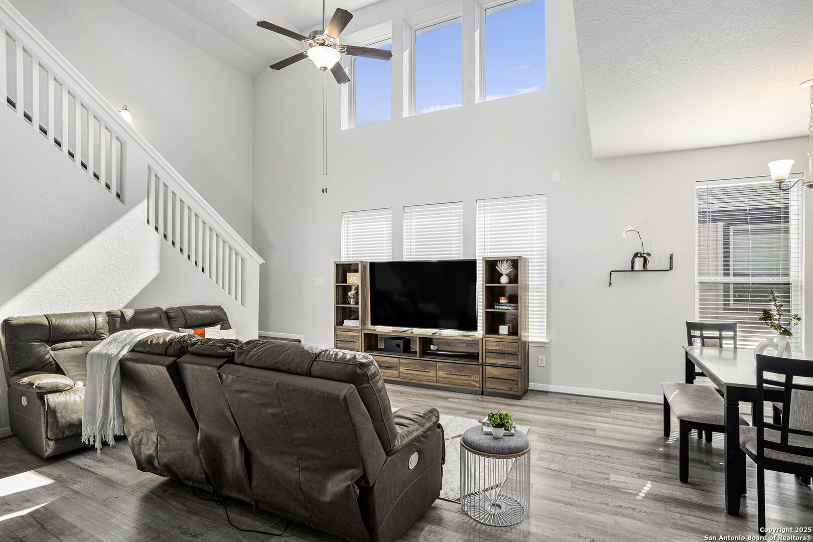 16615 Ginger Crossing Elmendorf, TX 78112 - Photo 5 of 31 a living room with furniture and a flat screen tv