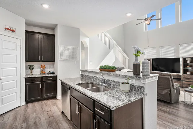 a kitchen with a stove and a sink
