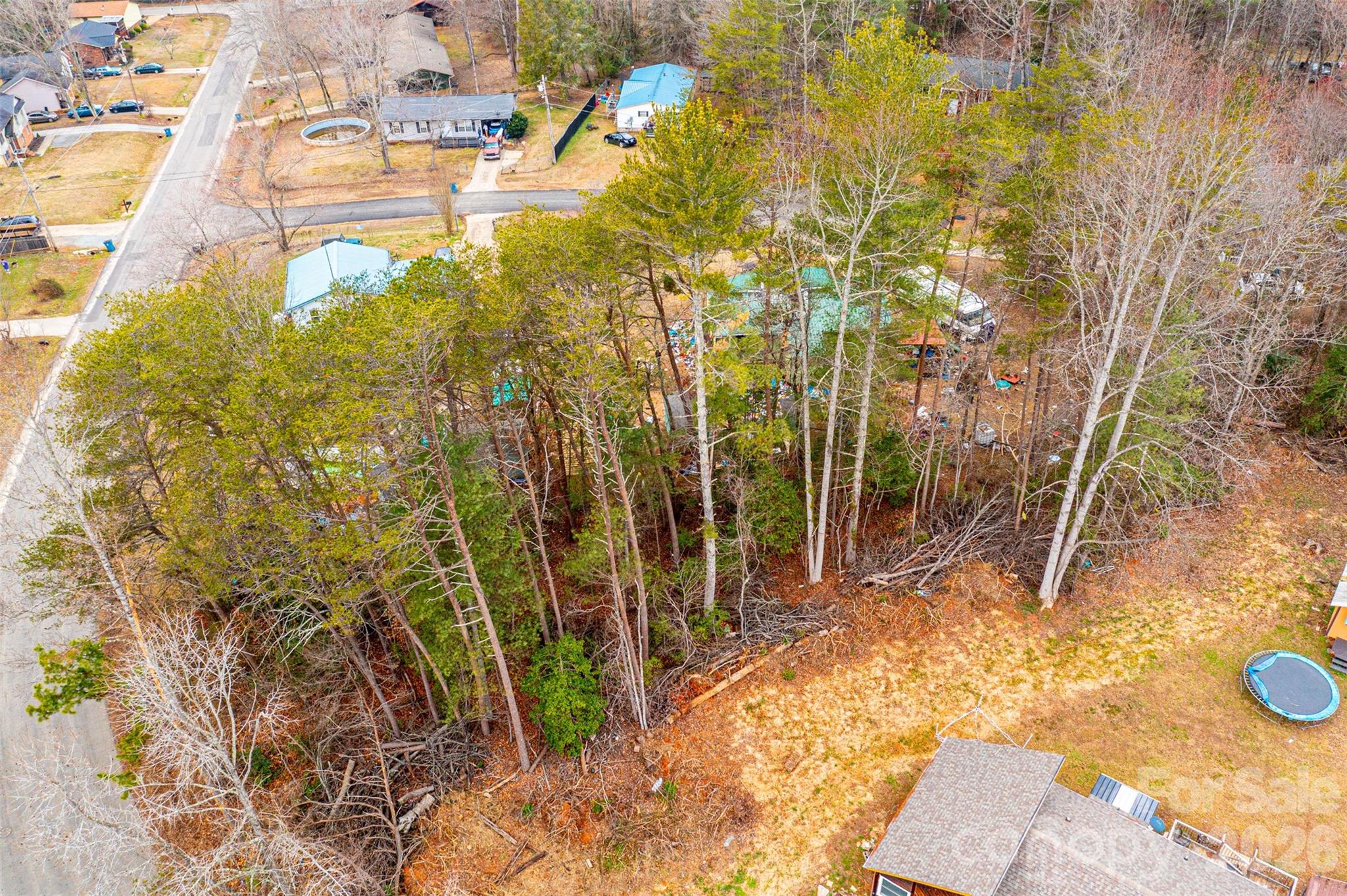 Tba Tablerock Road, Unit 14 Lenoir, NC 28645 - Photo 6 of 6 a view of a yard with plants and wooden fence
